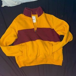 Bluenotes cropped hoodie, size SM, burnt yellow.